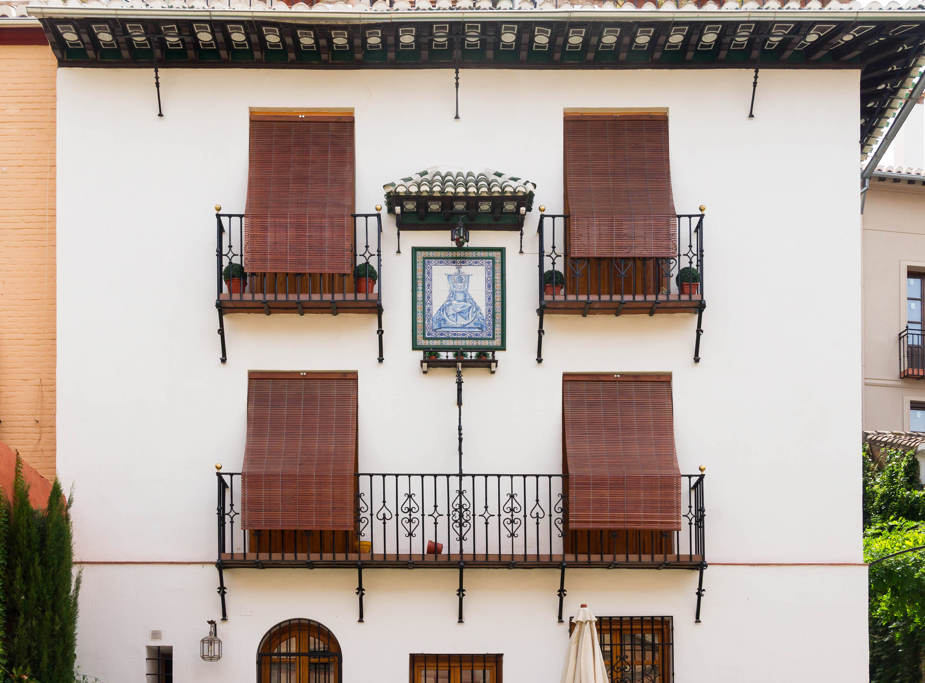 Detail facade house with Virgen de las Angustias Granada Spain