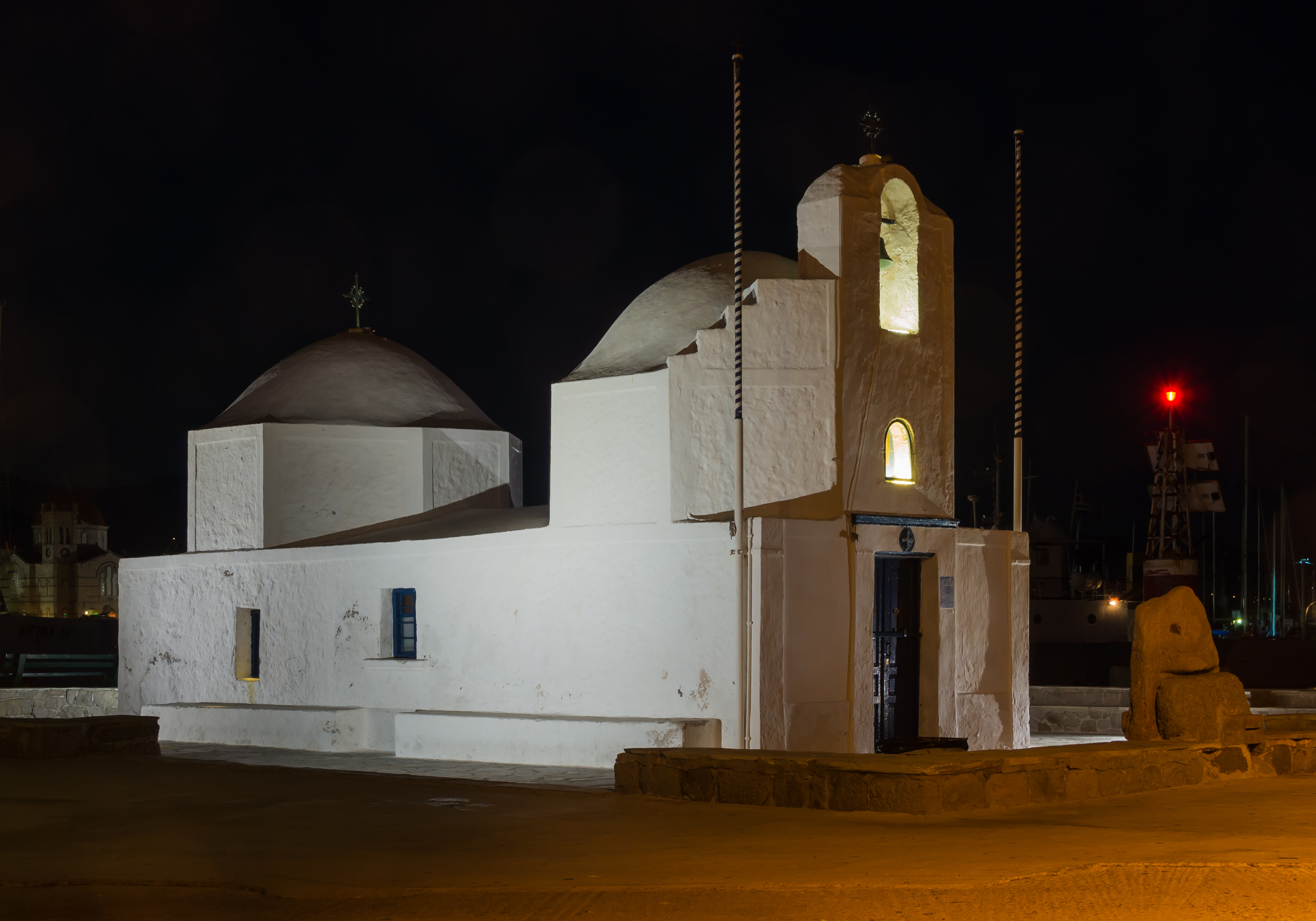 Night view chapel harbour Aegina Greece