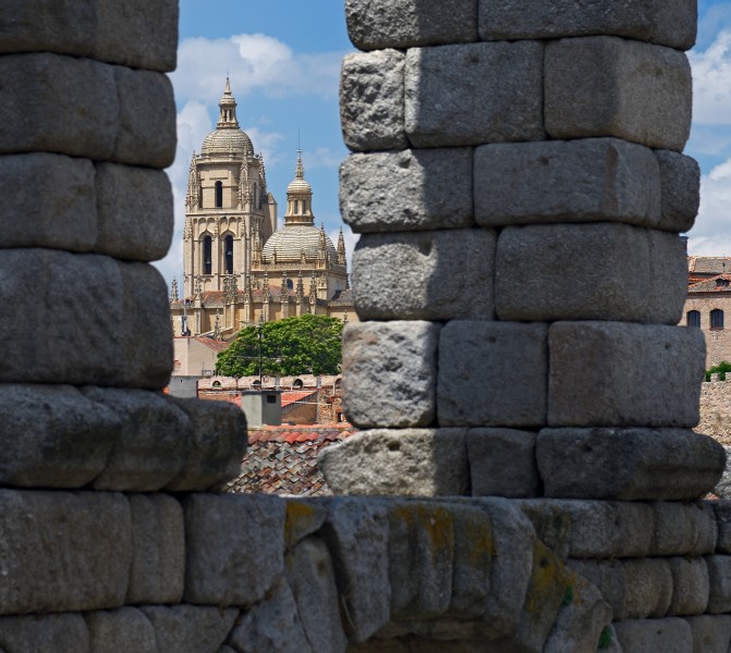 View of the Cathedral through the arches of the Aqueduct. Segovia, Spain
