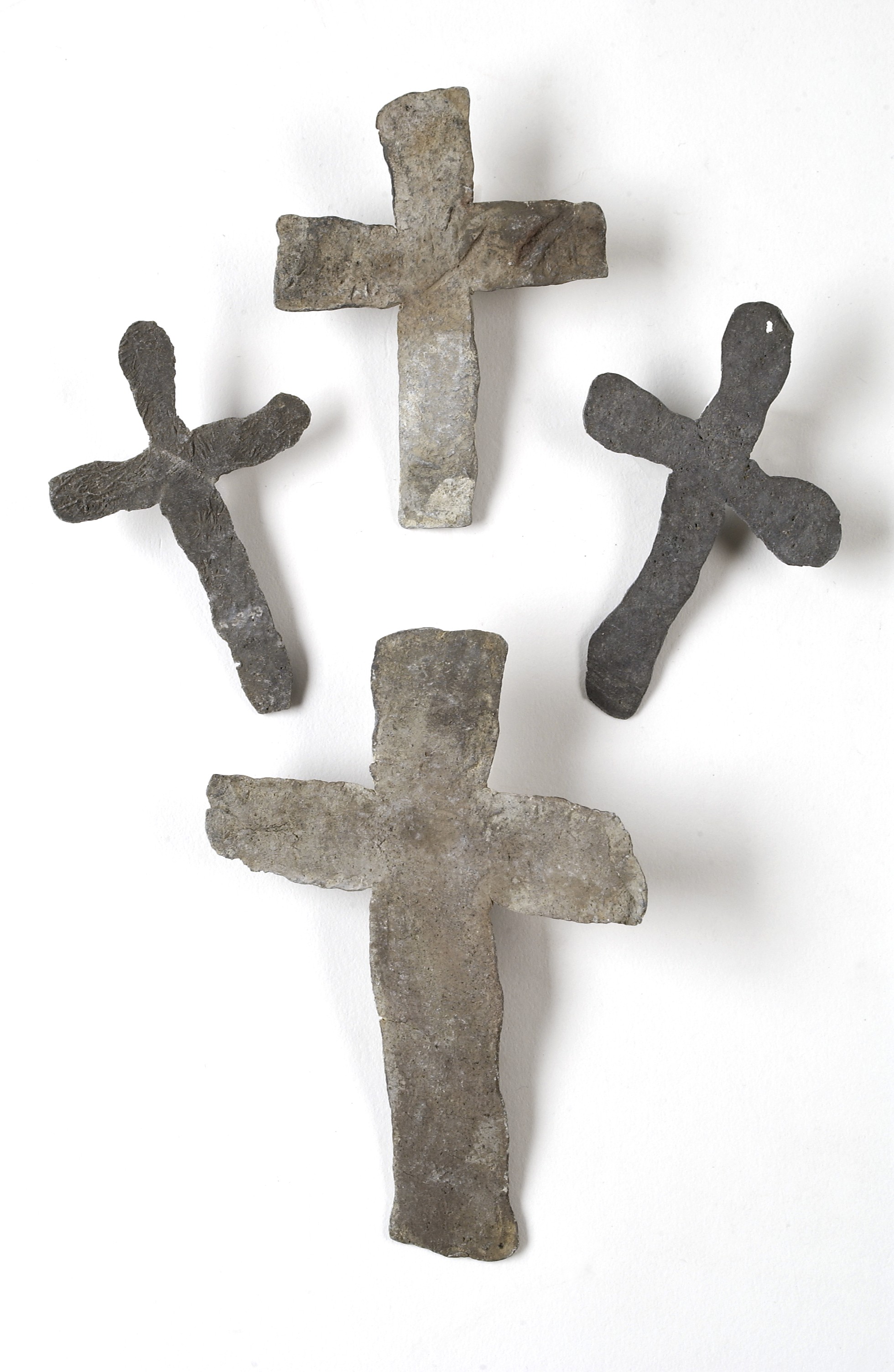 A selection of four lead mortuary crosses Wellcome L0035480