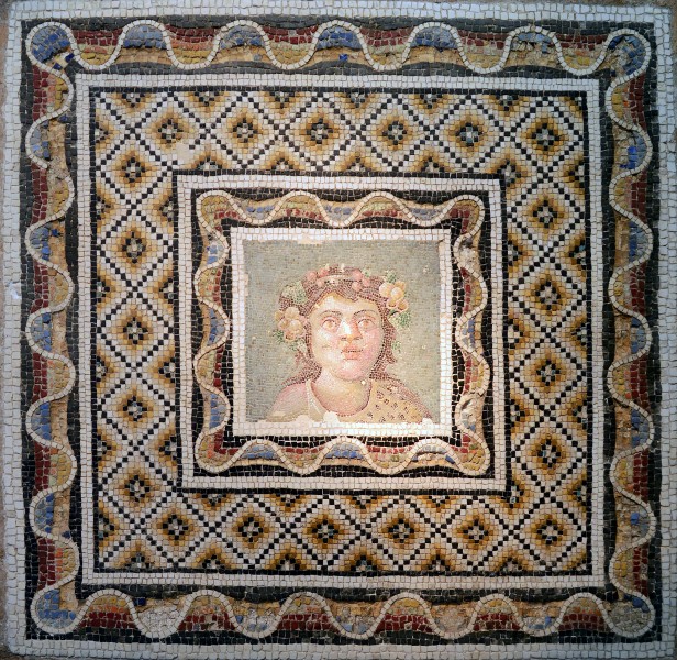 Floor mosaic with the face of dionisio