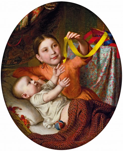 Zwei Kinder mit Seidenbaendern spielend