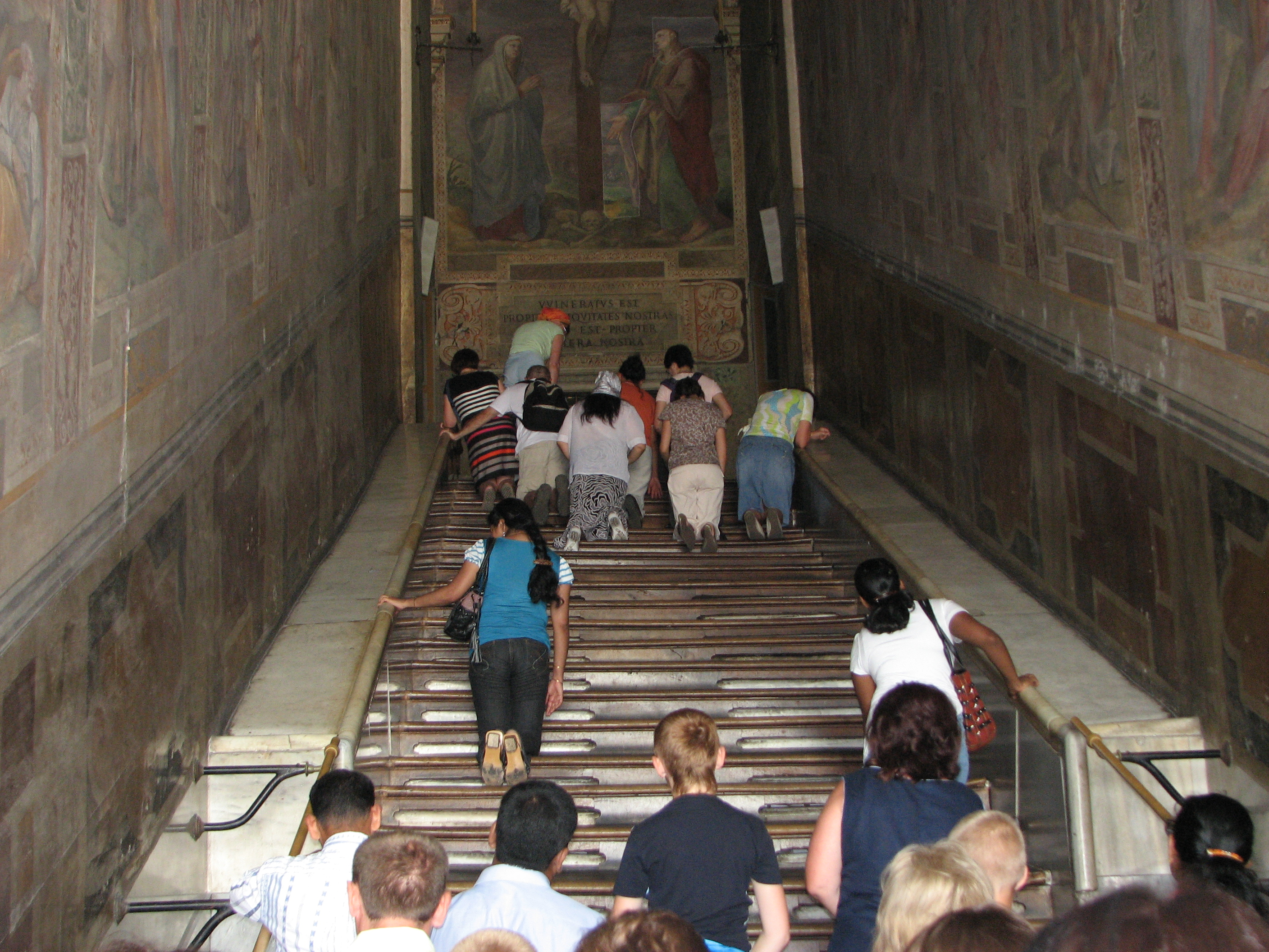 People on stairs (brought from the Holy Land) on which Jesus was coming to Pilate. Rome, Italy, European Union, August 2011, picture 27.