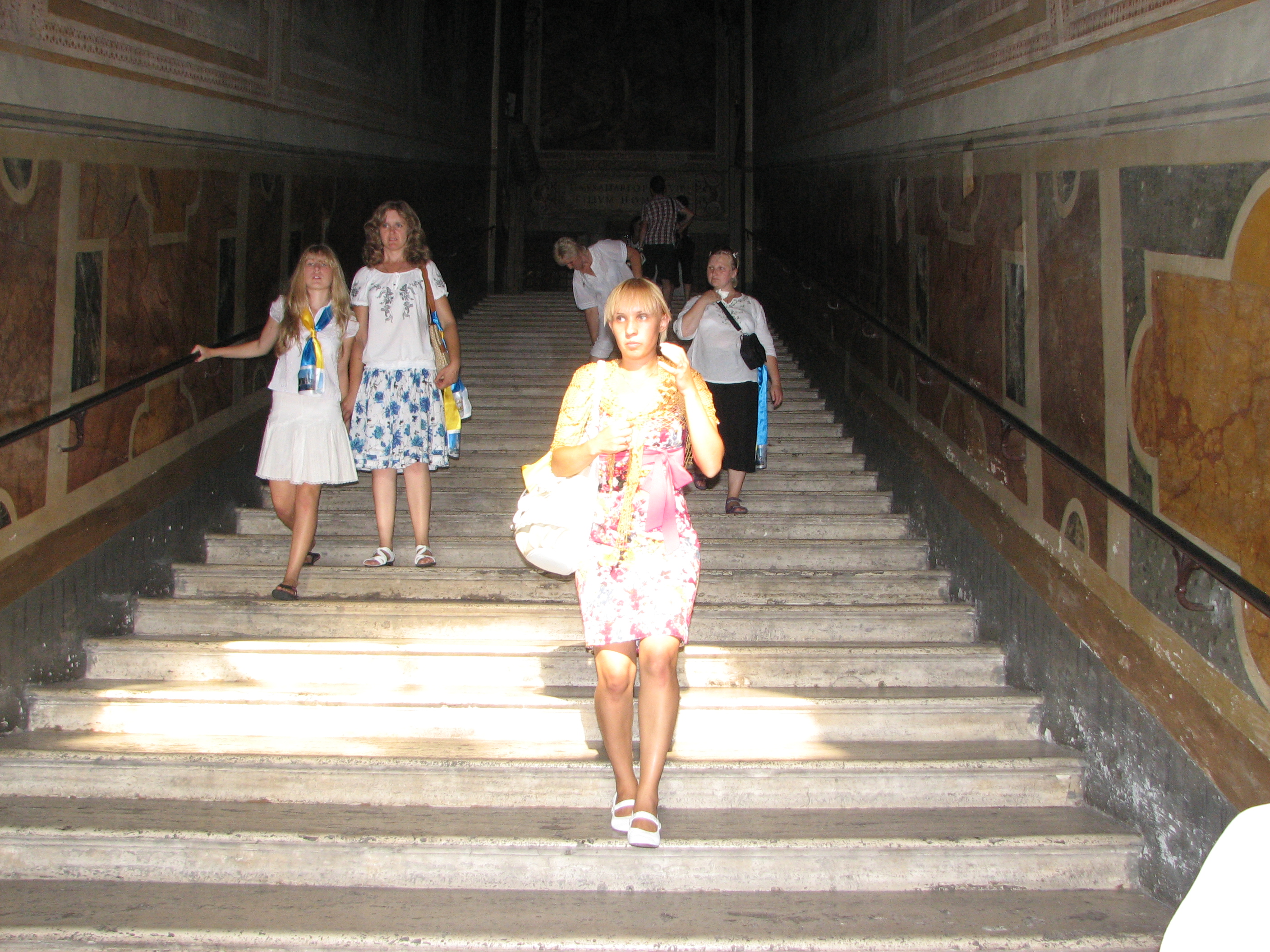 People on stairs (brought from the Holy Land) on which Jesus was coming to Pilate. Rome, Italy, European Union, August 2011, picture 28.