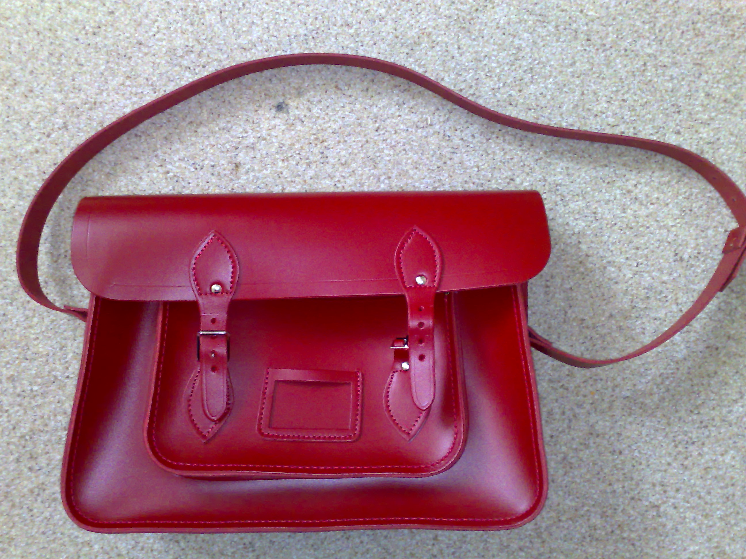 Red satchel by Cambridge Satchel Company