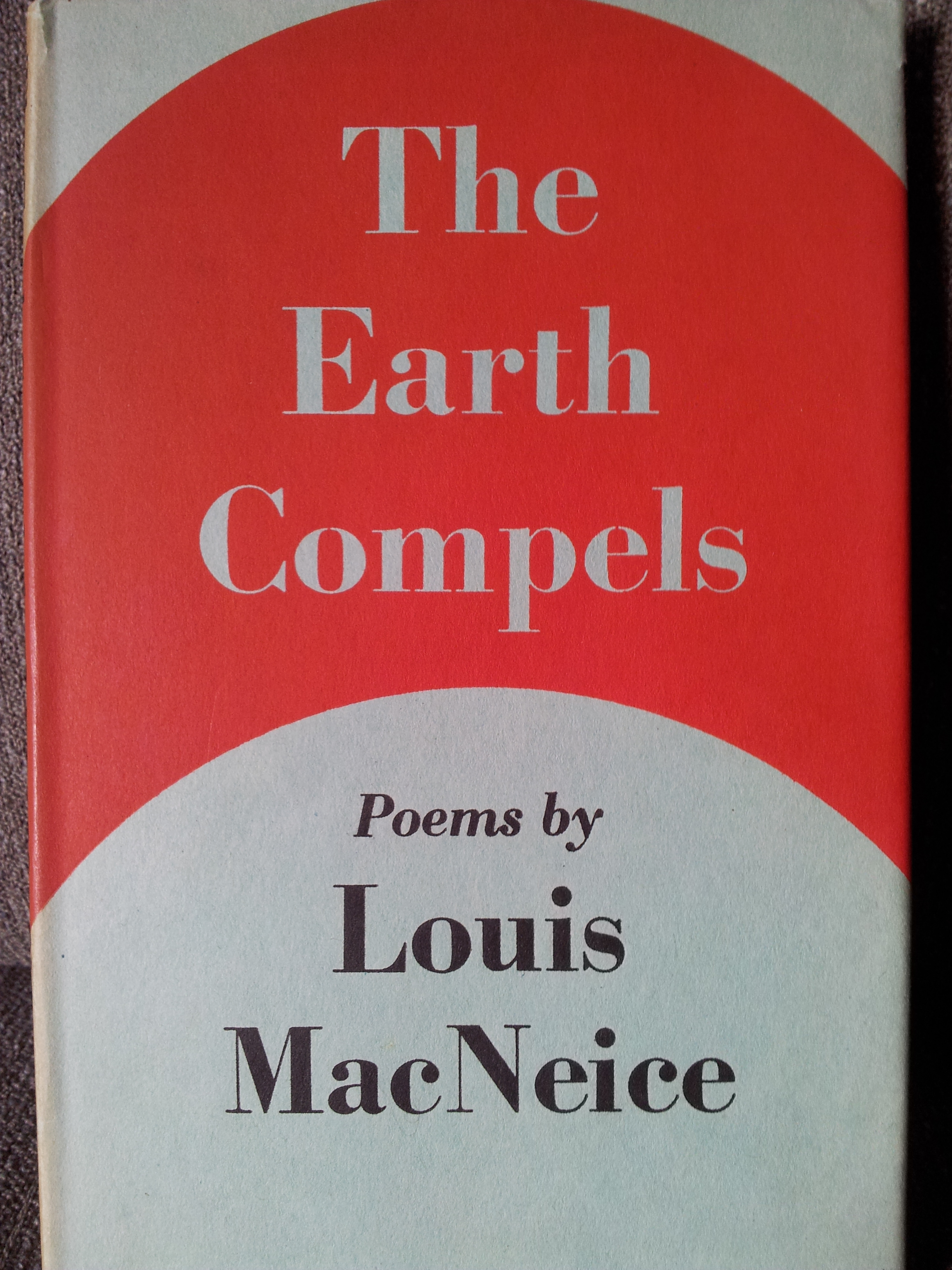 The Earth Compels dust jacket