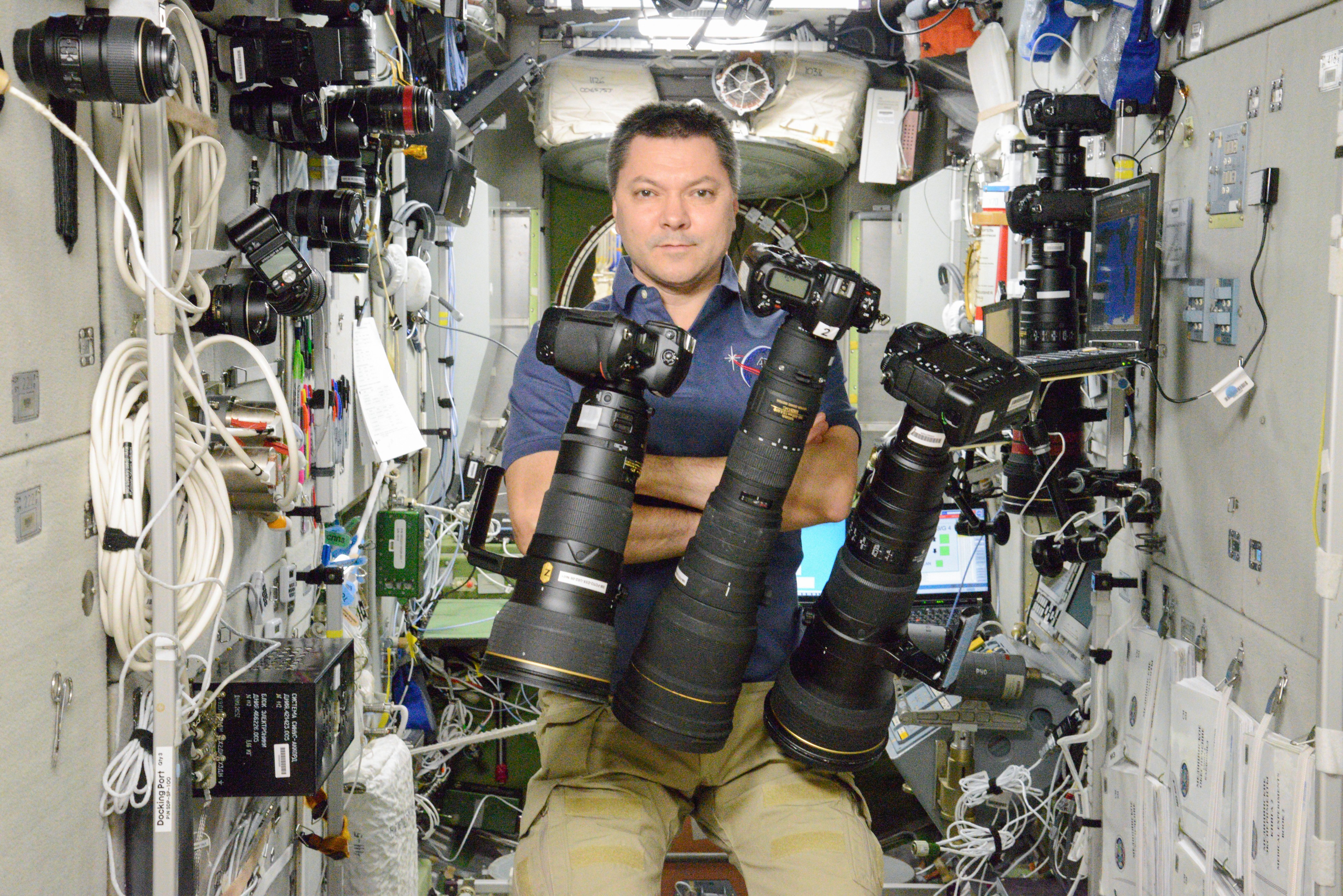 ISS-45 Oleg Kononenko with photo equipment in the Zvezda Service Module