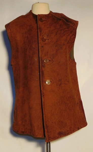 Brown leather sleeveless waistcoat, British