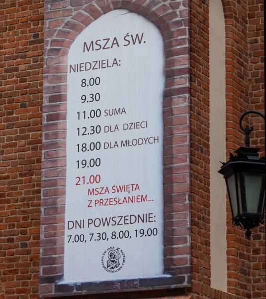 a Holy Mass schedule at a church in Warsaw (Warszawa), Poland, June 2014, picture 8/9