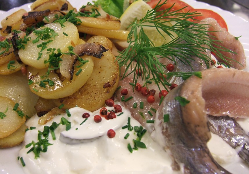 Herring with sour cream and onion and fried potato
