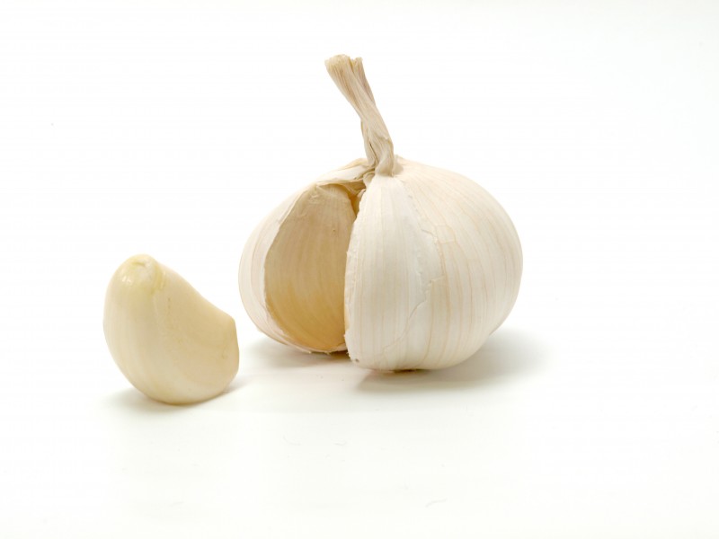 Opened garlic bulb with garlic clove