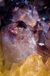 Amethyst & Quartz Crystals Close-up. Rock & mineral shop, unknown source.