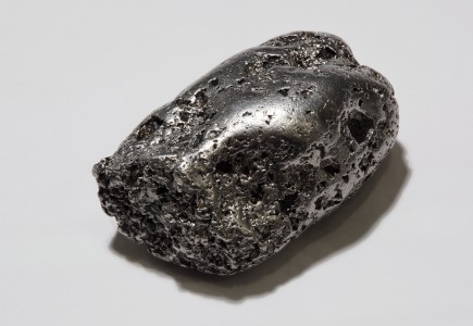 native Platinum nugget, locality Kondyor mine, Khabarovsk Krai, Russia. Size ca. 35 Г— 23 Г— 14 mm, weight ca. 112g = 3.6 oz. Collection: M.R.