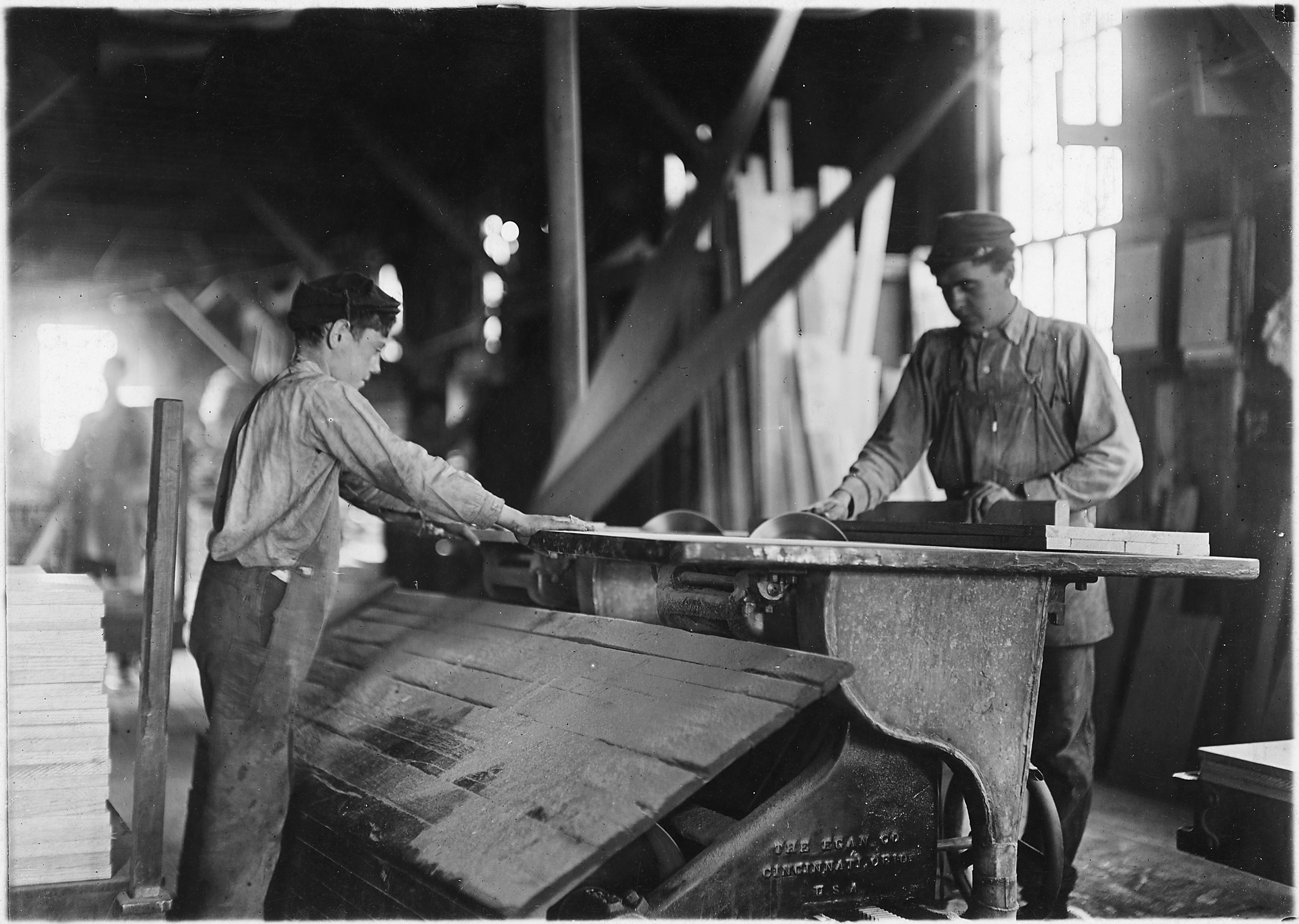 Boy working at double circular saws. N.Y. Dimension Supply Co. Evansville, Ind. - NARA - 523095