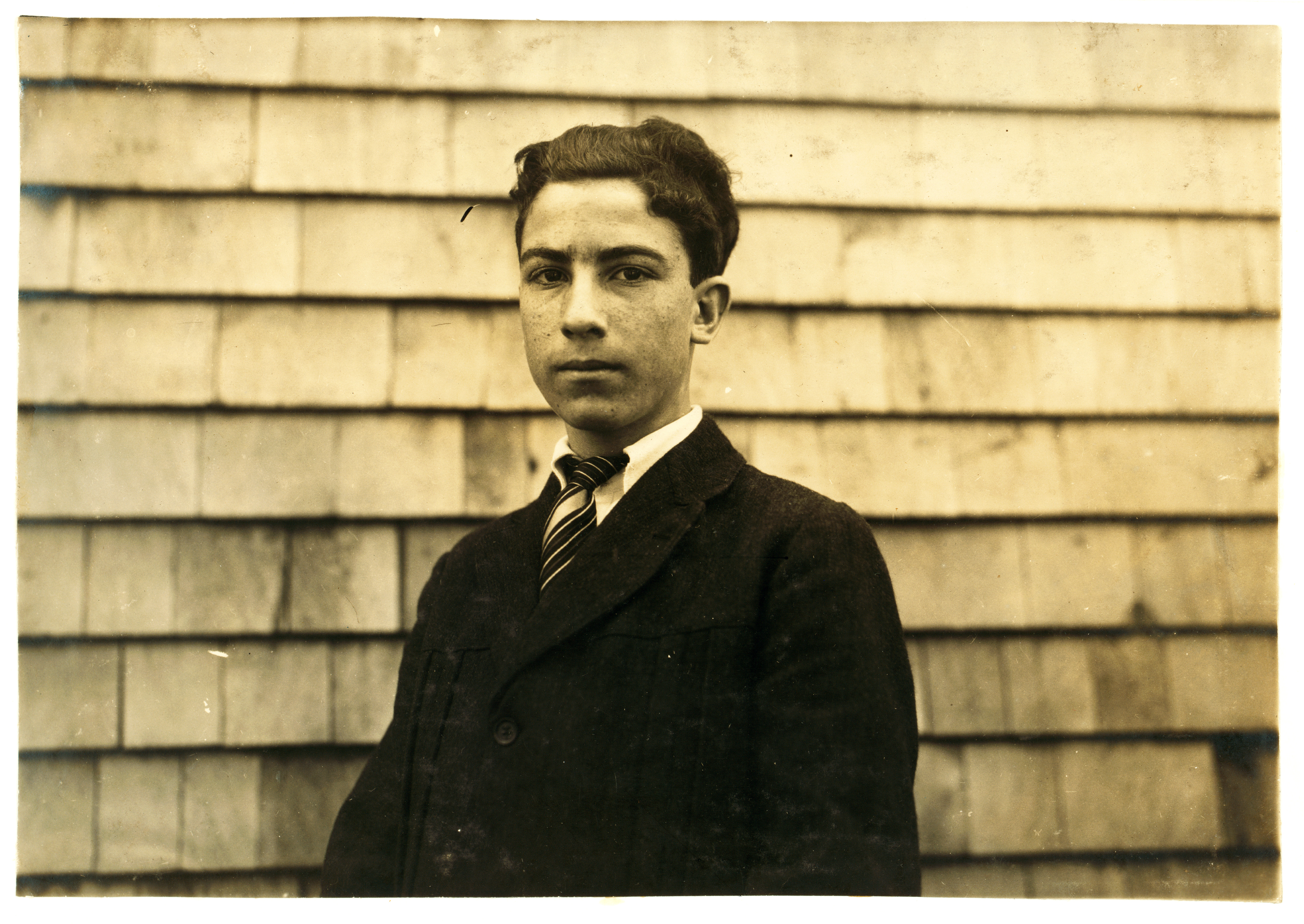 Lewis Hine, John Megna, 16 years, iron worker - sweeper, Fall River, Massachusetts, 1916