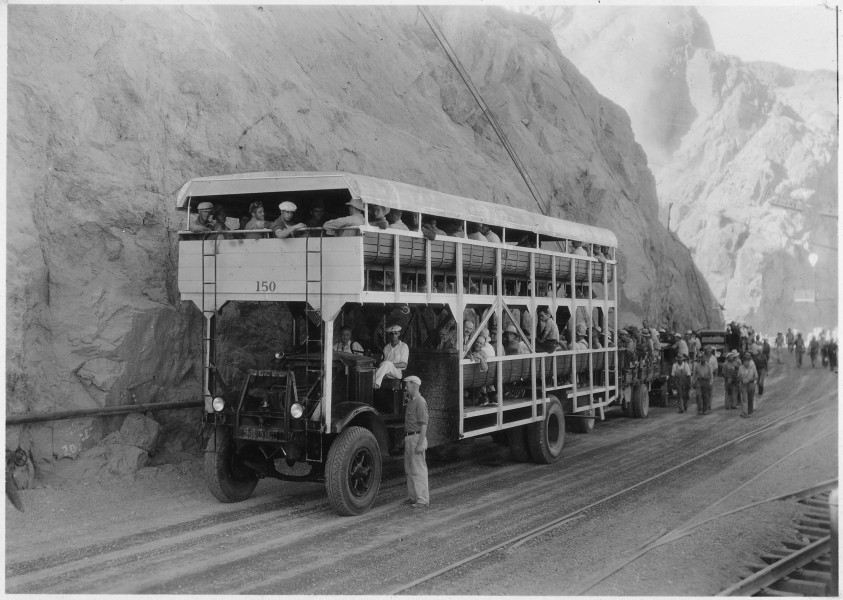 Double-decked coach used in transporting Six Companies, Inc., workmen from Boulder City to dam, Capacity 150 men - NARA - 293924