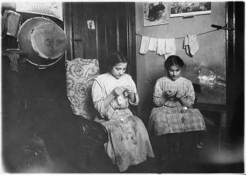 Katie, 13 years old, and Angeline, 11 years old, making cuffs, Irish lace. Income about $1 a week. Works some nights... - NARA - 523512