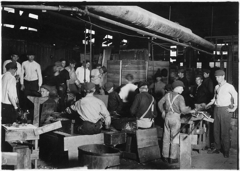 Scene in More-Jonas Glass Co. Small boy in center of photo with cap pulled down over face was undoubtedly under 14... - NARA - 523233