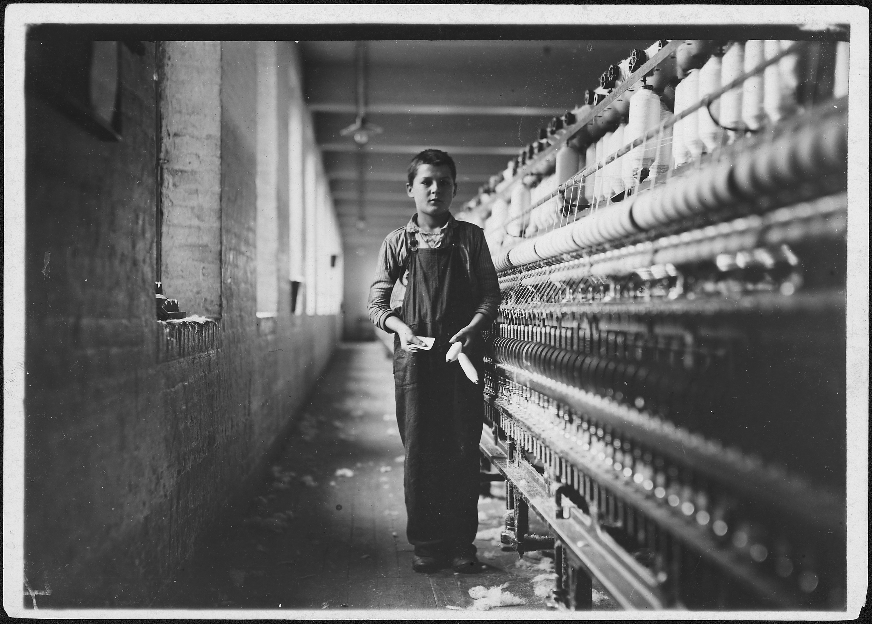 Tony Soccha, a young bobbin boy, been working there a year. Chicopee, Mass. - NARA - 523488