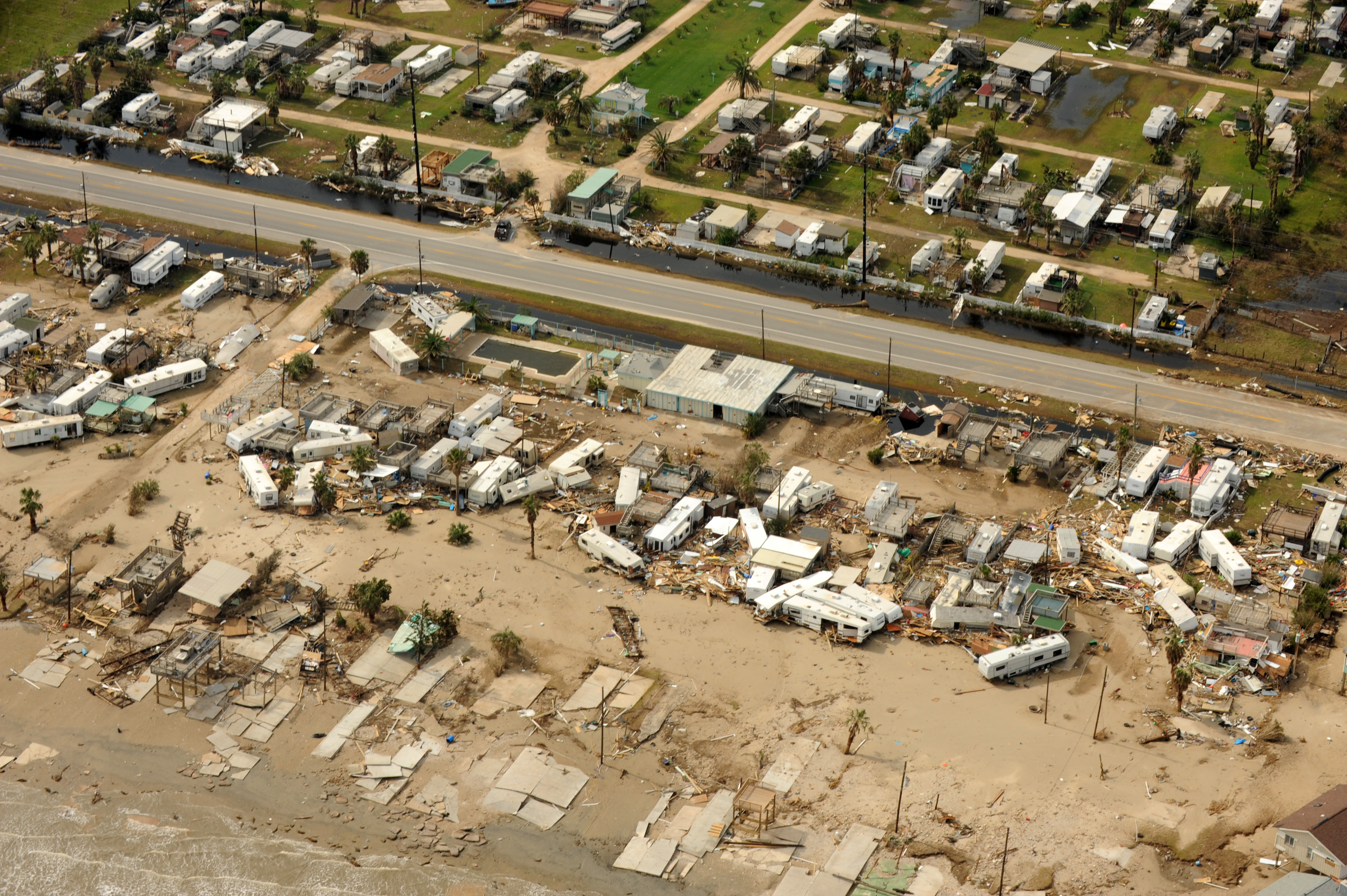 FEMA - 38449 - Aerial of damaged beach front mobile home park in Texas