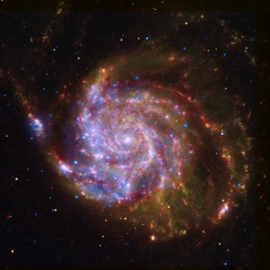 ABOUT THIS IMAGE:
This image of the spiral galaxy Messier 101 is a composite of views from the Spitzer Space Telescope, Hubble Space Telescope, and Chandra X-ray Observatory. Each wavelength region shows different aspects of celestial objects and often reveals new objects that could not otherwise be studied. The red color shows Spitzer's view in infrared light. It highlights the heat emitted by dust lanes in the galaxy where stars can form. The yellow color is Hubble's view in visible light. Most of this light comes from stars, and they trace the same spiral structure as the dust lanes. The blue color shows Chandra's view in X-ray light. Sources of X-rays include million-degree gas, exploded stars, and material colliding around black holes. Such composite images allow astronomers to see how features seen in one wavelength match up with those seen in another wavelength. It's like seeing with a camera, night vision goggles, and X-ray vision all at once.
Object Names: M101, NGC 4547, The Pinwheel Galaxy
Image Type: Astronomical
Credit: NASA, ESA, CXC, SSC, and STScI