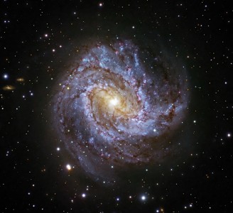 Located about 15 million light-years away towards the Hydra (the sea serpent) constellation, Messier 83 is a nearby face-on barred spiral galaxy with a classic grand design form. It is the main member of a small galactic group including NGC 5253 and about 9 dwarf galaxies. Messier 83 stretches over 40 000 light-years, making it roughly 2.5 times smaller than our own Milky Way. However, in some respects, Messier 83 is quite similar to our own galaxy. Both the Milky Way and Messier 83 possess a bar across their galactic nucleus, the dense spherical conglomeration of stars seen at the centre of the galaxies.