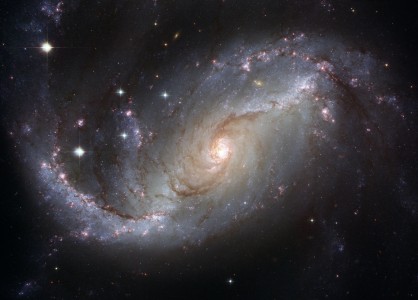 View of the nearby barred spiral galaxy NGC 1672 by NASA Hubble Space Telescope.