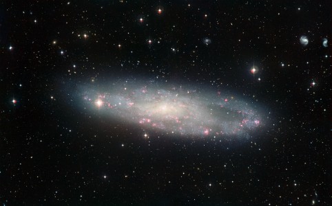 This picture of the spiral galaxy NGC 247 was taken using the Wide Field Imager (WFI) at ESOвЂ™s La Silla Observatory in Chile. NGC 247 is thought to lie about 11 million light-years away in the constellation of Cetus (The Whale). It is one of the closest galaxies to the Milky Way and a member of the Sculptor Group.