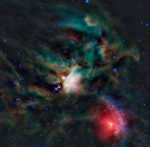 A rich collection of colourful astronomical objects is revealed in this picturesque image of the Rho Ophiuchi cloud complex from NASAвЂ™s Wide-field Infrared Explorer, or WISE. The Rho Ophiuchi cloud (pronounced вЂ?oh-fee-yoo-kiвЂ™ and named after a bright star in the region) is found rising above the plane of the Milky Way in the night sky, bordering the constellations Ophiuchus and Scorpius. ItвЂ™s one of the nearest star-forming regions to Earth, allowing us to resolve much more detail than in more distant similar regions, like the Orion nebula.
The amazing variety of different colours seen in this image represents different wavelengths of infrared light. The bright white nebula in the centre of the image is glowing due to heating from nearby stars, resulting in what is called an emission nebula. The same is true for most of the multi-hued gas prevalent throughout the entire image, including the bluish bow-shaped feature near the bottom right. The bright red area in the bottom right is light from the star in the centre вЂ“ Sigma Scorpii вЂ“ that is reflected off of the dust surrounding it, creating what is called a reflection nebula. And the much darker areas scattered throughout the image are pockets of cool dense gas that block out the background light, resulting in absorption (or вЂ?darkвЂ™) nebulae. WISEвЂ™s longer wavelength detectors can typically see through dark nebulae, but these are exceptionally opaque.
The bright pink objects just left of centre are young stellar objects (YSOs). These baby stars are just now forming; many of them are still enveloped in their own tiny compact nebulae. In visible light, these YSOs are completely hidden in the dark nebula that surrounds them, which is sometimes referred to as their baby blanket. We can also see some of the oldest stars in our Milky Way Galaxy in this image, found in two separate (and much more distant) globular clusters. The first cluster, M80, is on the far right edge of the image towards the top. The second, NGC 6144, is found close to the bottom edge near the centre. They both appear as small densely compacted groups of blue stars. Globular clusters such as these typically harbour some of the oldest stars known, some as old as 13 billion years, born soon after the Universe formed.
There are two other items of interest in this image as well. At the 3 oвЂ™clock position, relative to the bright central region, and about two-thirds of the way from the centre to the edge, there is a small faint red dot. That dot is an entire galaxy far, far away known as PGC 090239. And, at the bottom left of the image, there are two lines emerging from the edge. These were not created by foreground satellites; they are diffraction spikes (optical artefacts from the space telescope) from the bright star Antares that is just out of the field of view.