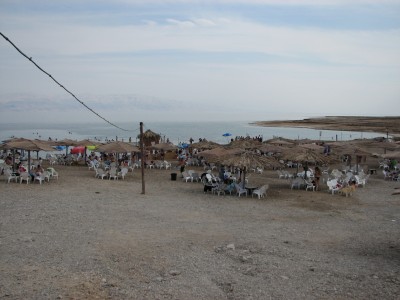 The Dead Sea, also called the Salt Sea, is a salt lake bordering Jordan to the east and Israel and the West Bank to the west. Its surface and shores are 423 metres below sea level, the lowest elevation on the Earth's surface. The Dead Sea is 377 m deep, the deepest hypersaline lake in the world. With 33.7% salinity, it is also one of the world's saltiest bodies of water, though Lake Assal (Djibouti), Garabogazköl and some hypersaline lakes of the McMurdo Dry Valleys in Antarctica (such as Don Juan Pond) have reported higher salinities. Just north of the Dead Sea is Jericho. Somewhere, perhaps on the southeastern shore, would be the cities mentioned in the Book of Genesis which were said to have been destroyed in the time of Abraham: Sodom and Gomorra (Genesis 18) and the three other Cities of the Plain - Admah, Zeboim and Zoar (Deuteronomy 29:23). Zoar escaped destruction when Abraham's nephew Lot escaped to Zoar from Sodom (Genesis 19:21-22). Before the destruction, the Dead Sea was a valley full of natural tar pits, which was called the vale of Siddim. King David was said to have hidden from Saul at Ein Gedi nearby.<br>Name of photo's author: Free-Photos.Biz<br>This photo was taken in: The Dead Sea, Israel