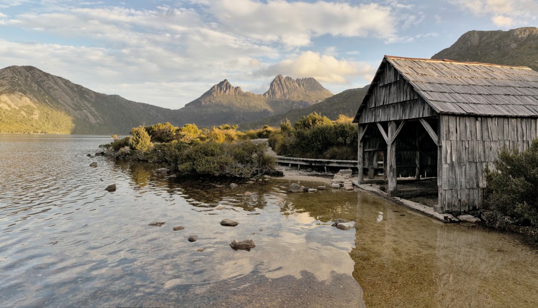 Boat shed and Cradle Mountain at Dove Lake, Tas