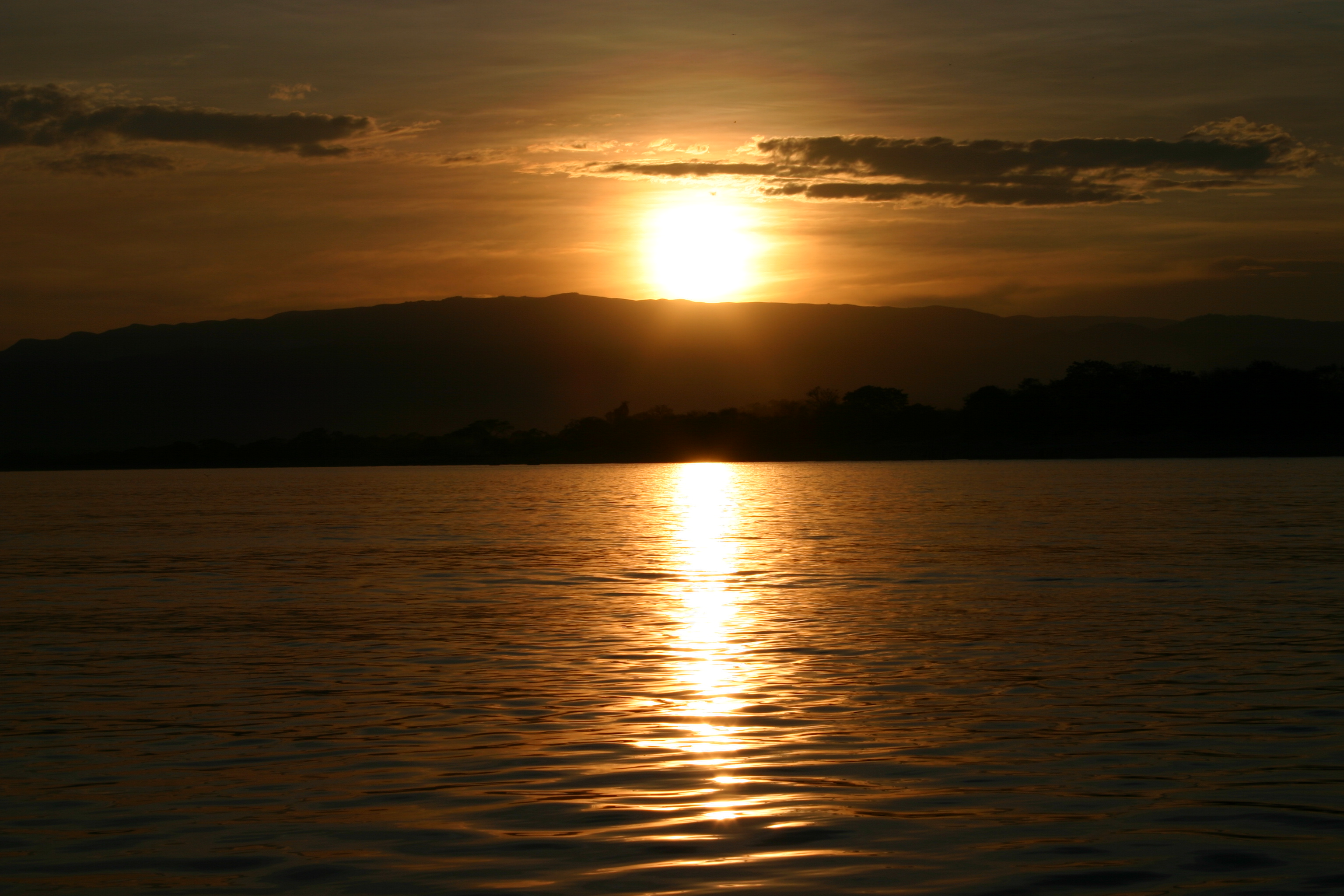 Sun goes down over lake malawi (205997388)