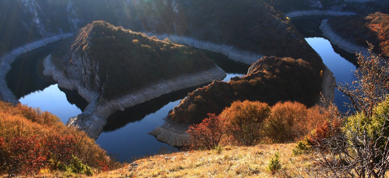 Curving meanders in Special Nature Reserve Uvac River canyon valley, Serbia