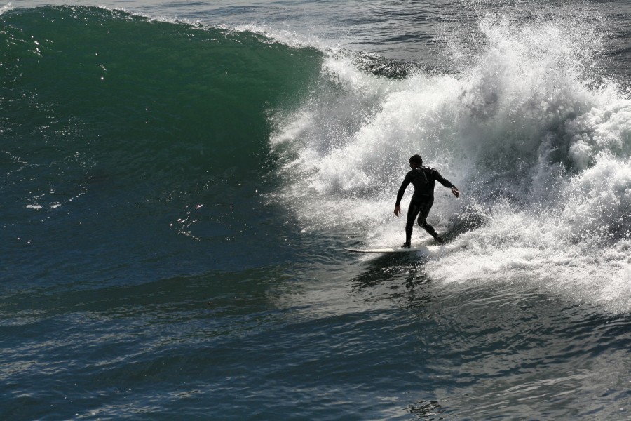 A surfer under wave