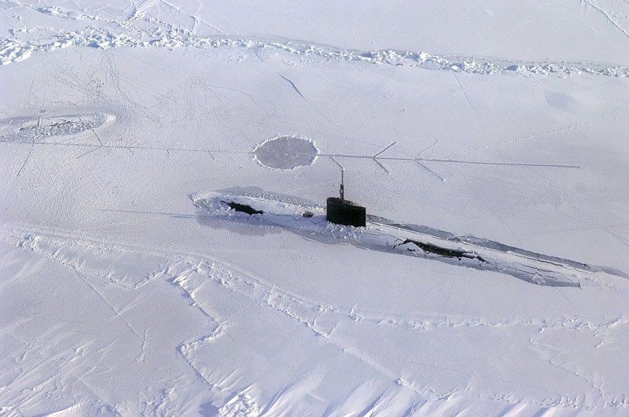 US Navy 070318-N-3642E-473 Los Angeles-class fast attack submarine USS Alexandria (SSN 757) is submerged after surfacing through two feet of ice during ICEX-07, a U.S. Navy and Royal Navy exercise