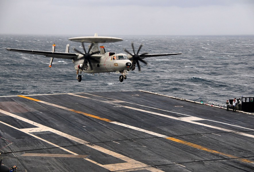 US Navy 100205-N-4774B-697 mdr. Miguel Peko, prospective commanding officer of Carrier Airborne Early Warning Squadron (VAW) 125, lands an E-2C Hawkeye aircraft aboard the Nimitz-class aircraft carrier USS Carl Vinson (CVN 70)
