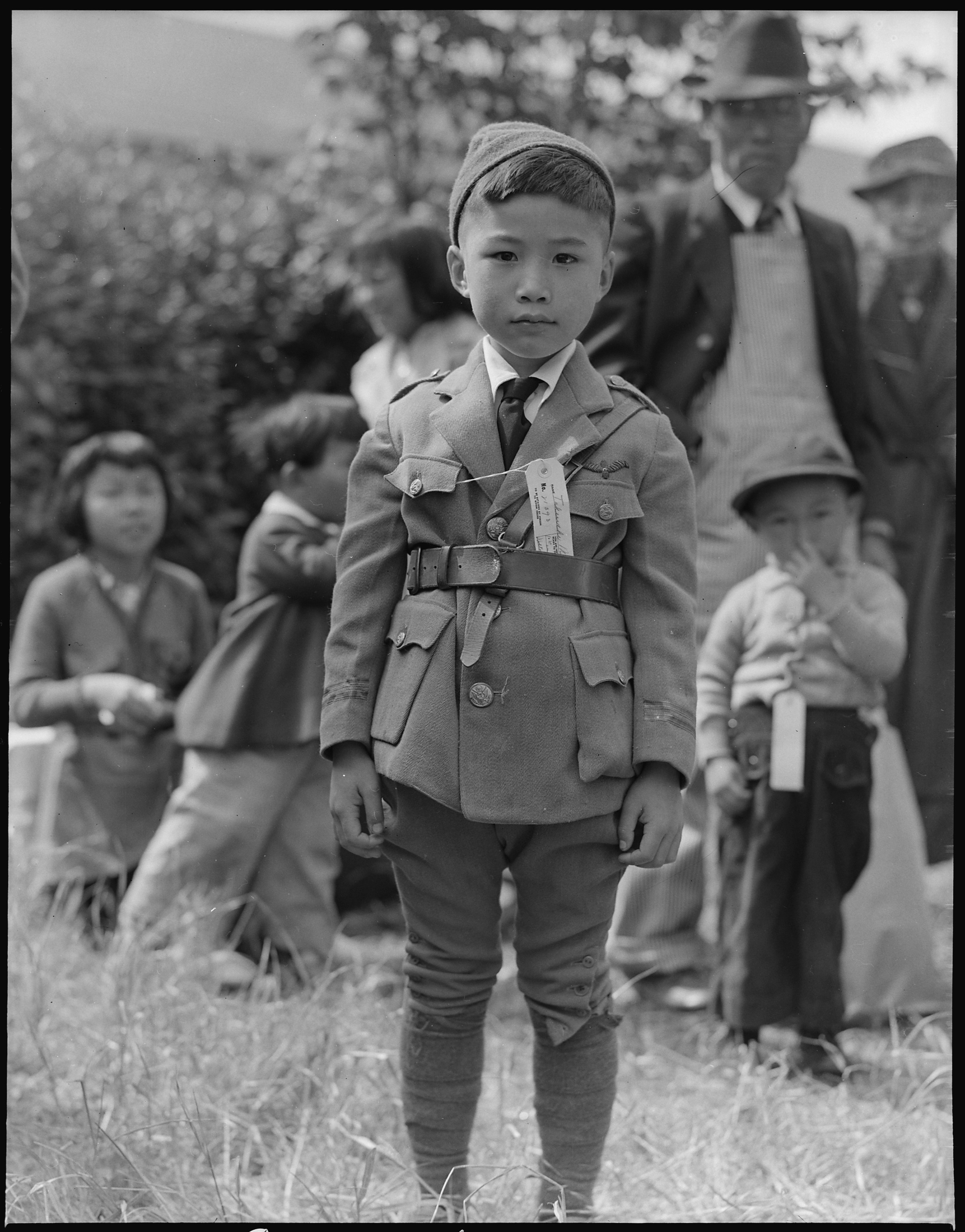 Centerville, California. This youngster is awaiting evacuation bus. Evacuees of Japanese ancestry . . . - NARA - 537552
