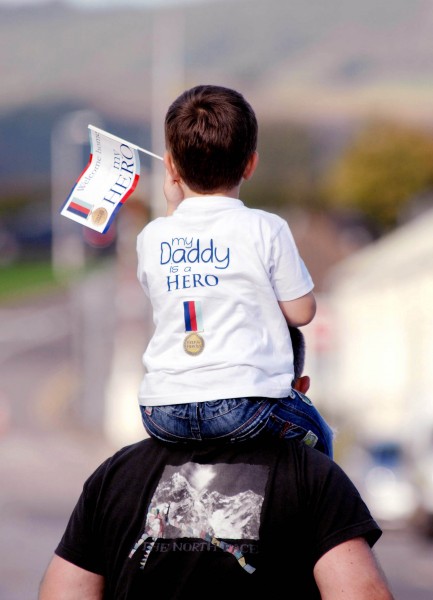 A Child Waiting for His Royal Marine Dad to Return from Afghanistan MOD 45158112
