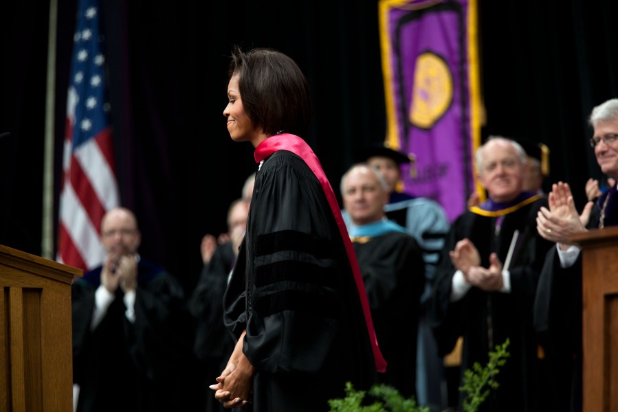 Michelle Obama receives applause following her commencement address, 2011
