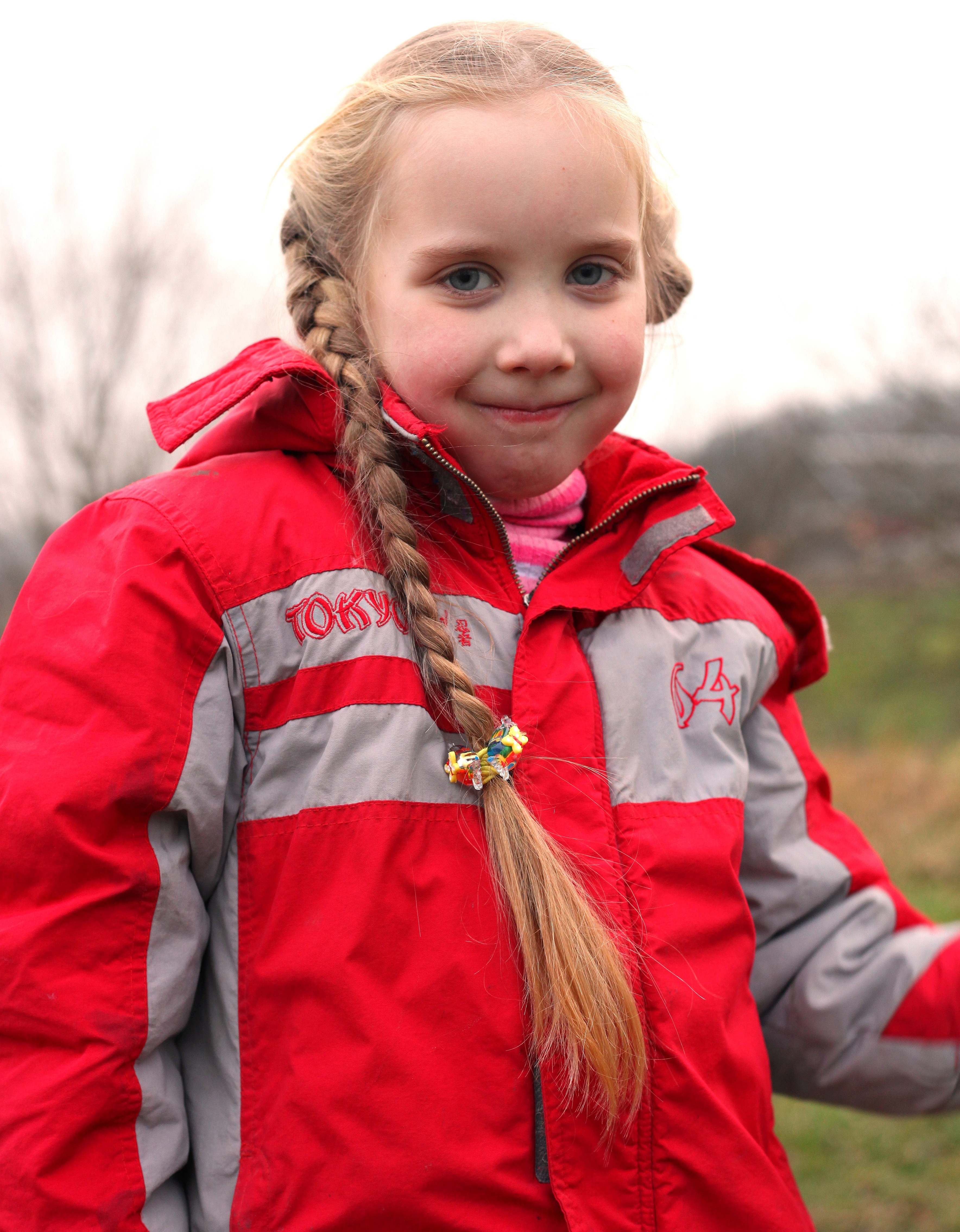 a cute blond 6-year-old Catholic girl with a pigtail, photo 2