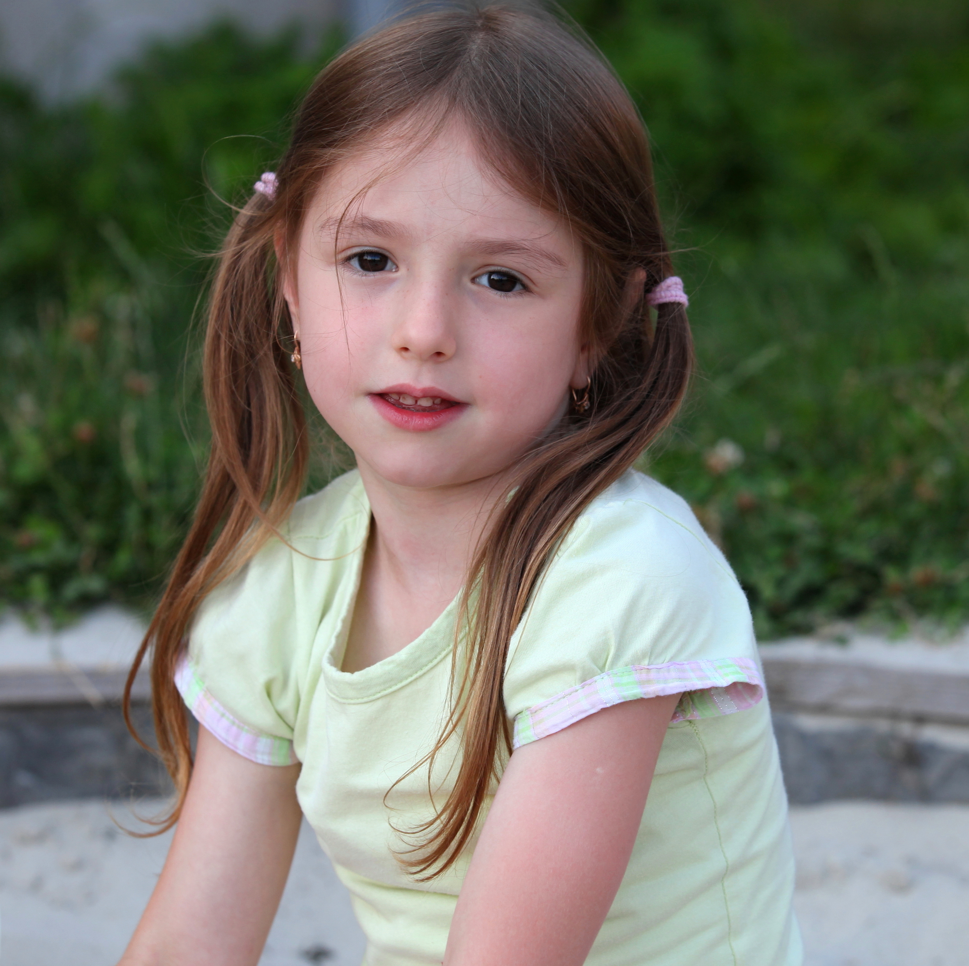 a cute brunette child girl in a Catholic camp in July 2013, portrait 2/7