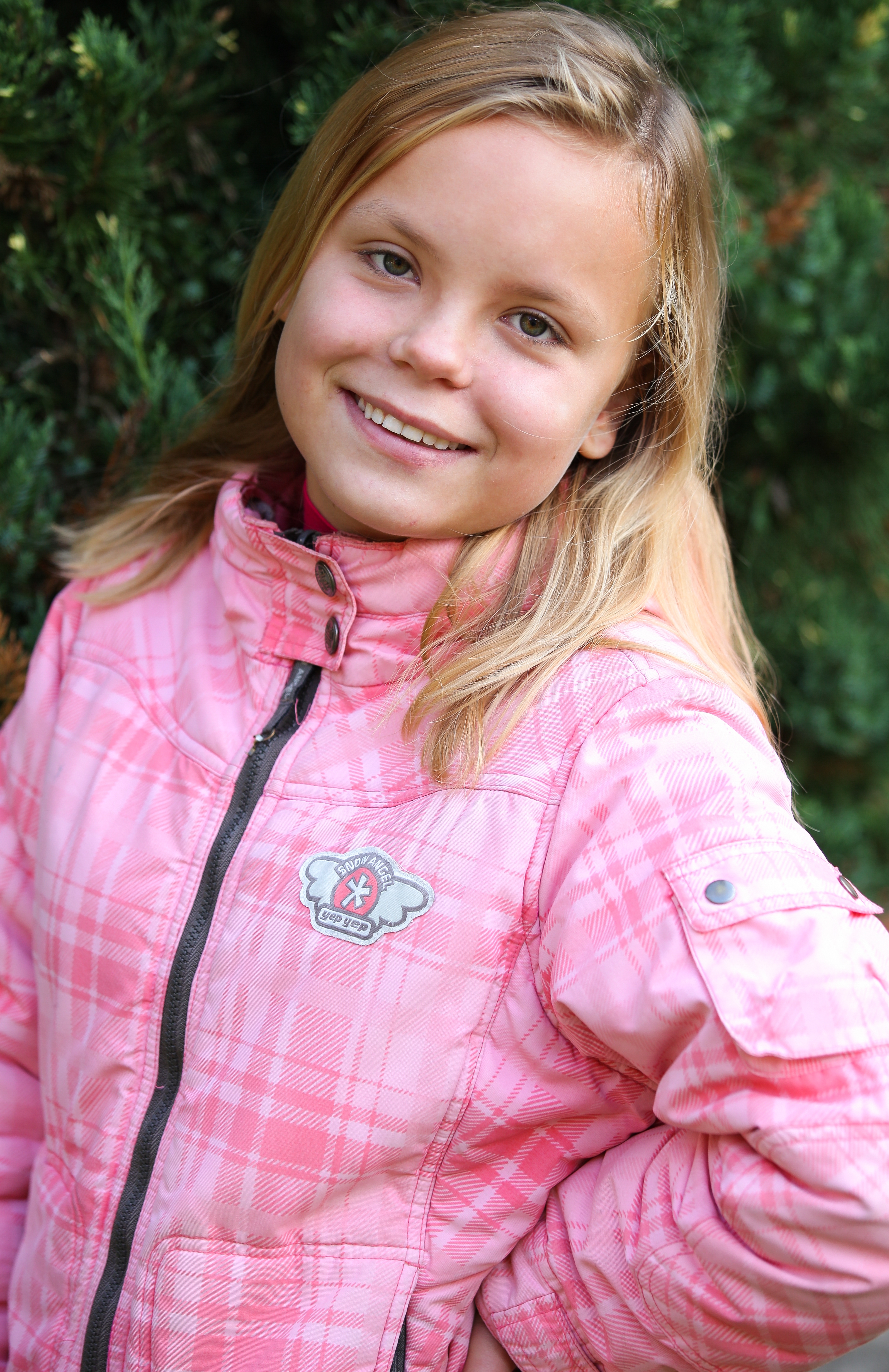 a young blond girl photographed in September 2013, picture 1/4