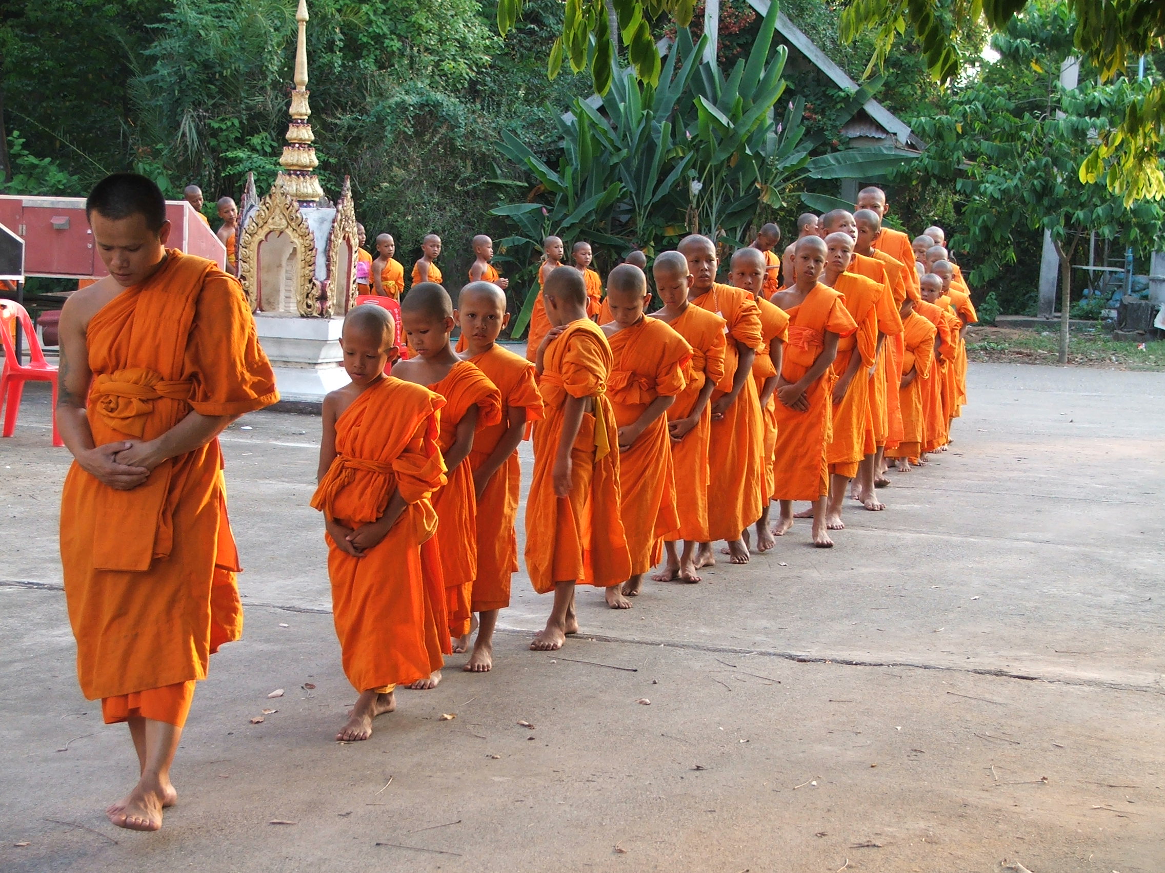 Novice in the Buddhist religion faculty is walking back and forth