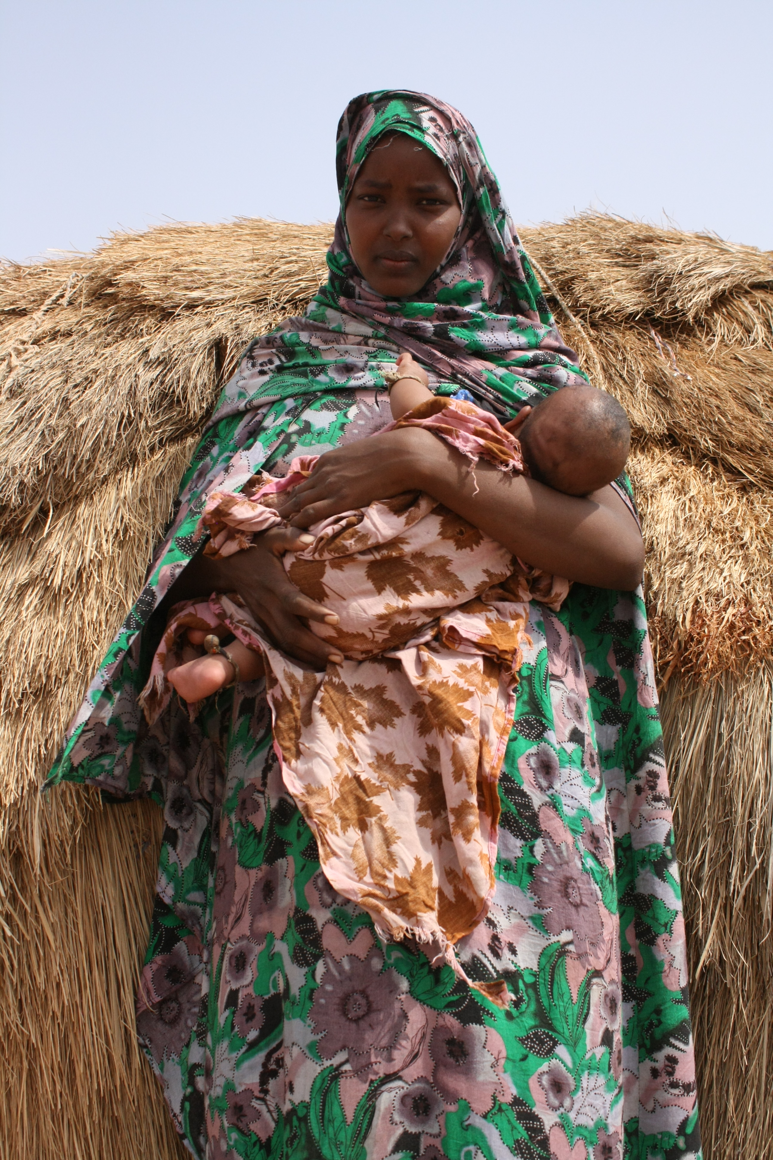 Oxfam East Africa - Halima Ahmed Ali holds her newborn baby