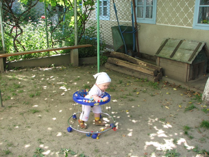 A baby kid girl learning to walk, picture 031