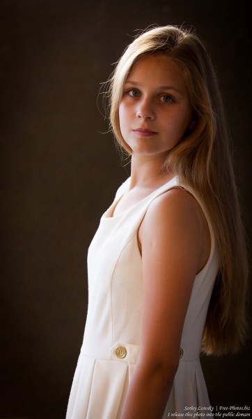 a 12-year-old blond girl wearing a white dress photographed in July 2015 by Serhiy Lvivsky, picture 3