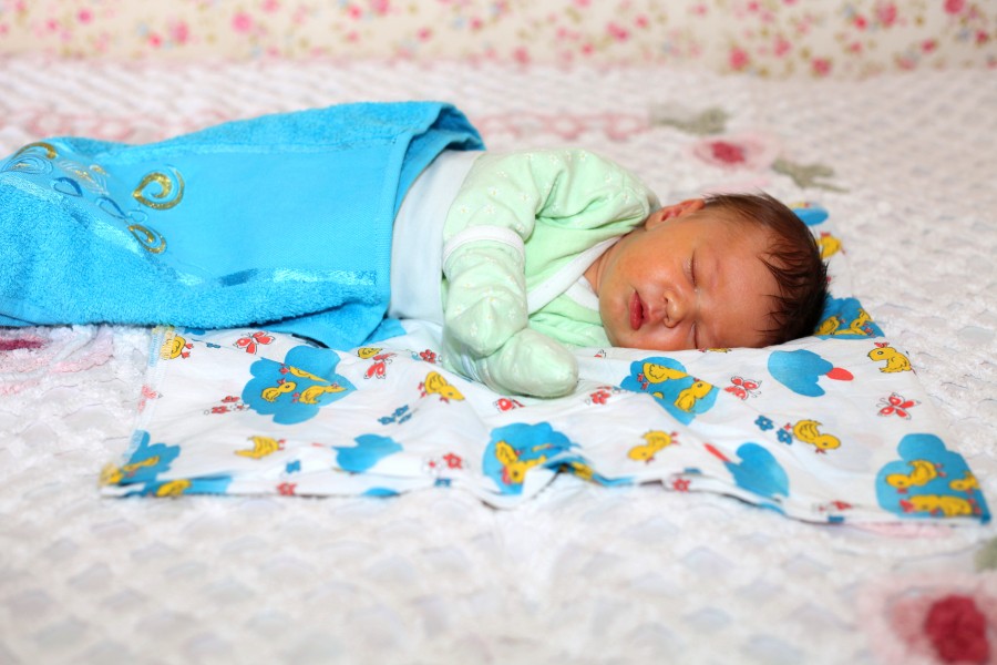 a 6-day old baby boy sleeping, picture 2 out of 2, June 2013