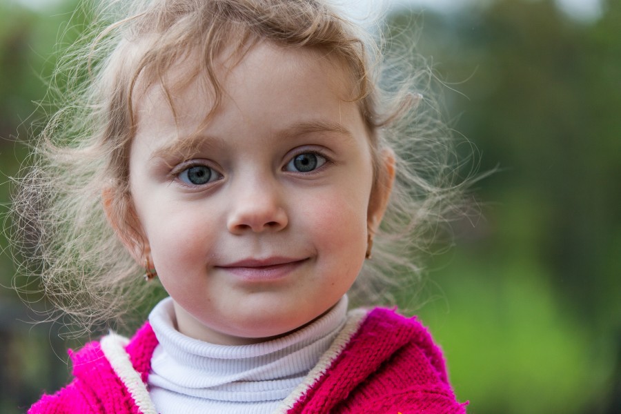 a Catholic cute blond child girl photographed in May 2014, image 3 out of 4