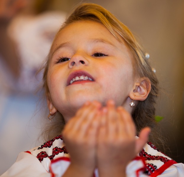 a cute blond child girl in a Catholic kindergarten photographed in November 2013, picture 2