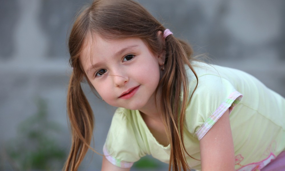 a cute brunette child girl in a Christian camp in July 2013, portrait 3/7